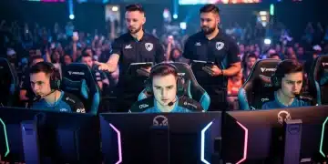 E-sports player in a vibrant arena, focused yet supported, illustrating burnout prevention.